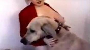 Busty mature woman endures whole dog cock in her moist cunt