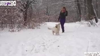 Beautiful winter bestiality sex session with a white doggy