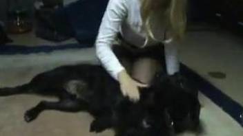 Gorgeous blond-haired chick takes care of that dog dick