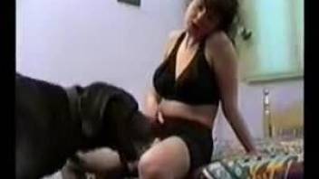 Hardcore fuck scene with a slutty babe and her dog