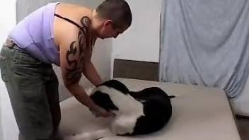 Butch bitch getting fucked by a big-dicked dog