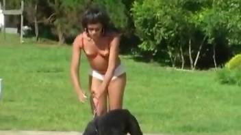 Hot bitches fucking the same dog in a hot outdoor vid
