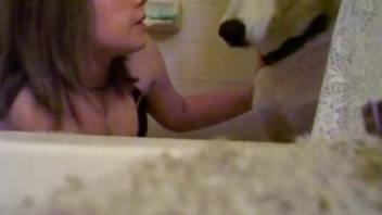 Adorable zoophile chick makes out with a beast