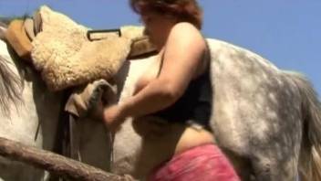 Busty babe fucks with her retriever and pony for the first time