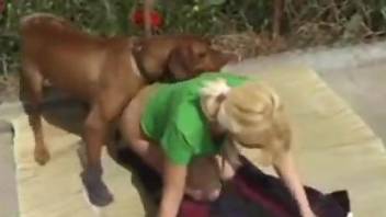 Blonde wife outdoor drilled by the dog and splashed with jizz