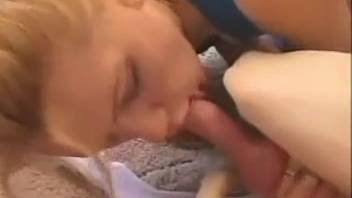 Blonde woman is obsessed with deep-throating the dog's penis